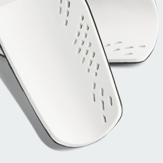 Caneleira Adidas Tiro